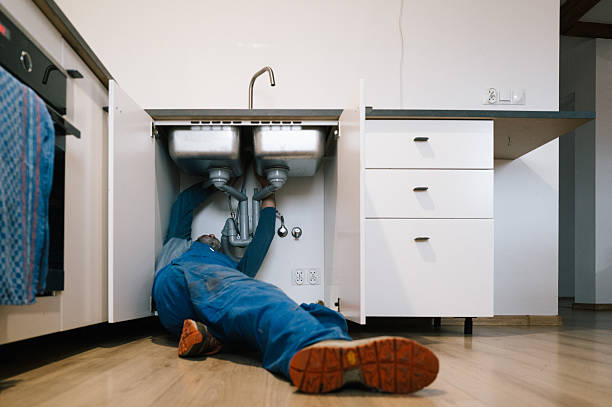 Professional Emergency Plumber technician working in Greenfield, OH